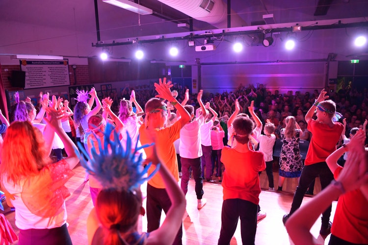 Students dancing on stage